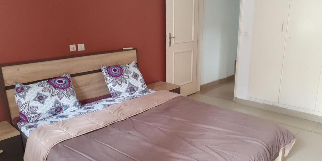 Appart Sly Abidjan Cocody Exterior foto